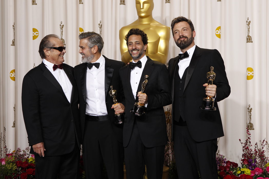Jack Nicholson with winners George Clooney, Grant Heslov and Ben Affleck in the press room at the 85th Academy Awards.